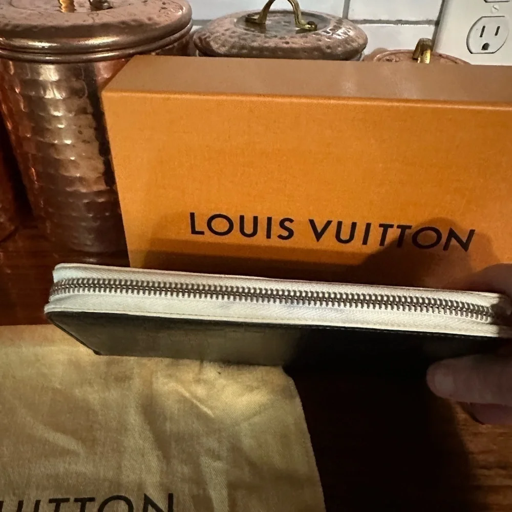 Louis Vuitton black wallet with dust bag COA and box